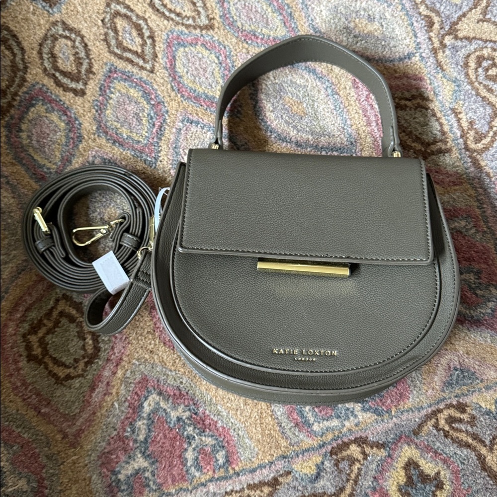 NEW Katie Loxton Alyce Saddle Bag in a khaki green shade. Sustainable style